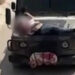 Israeli army straps Palestinian on military jeep during raid in Jenin, in this screengrab from a video, in the Israeli-occupied West Bank, June 22, 2024. (Reuters)
