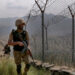 FILE - Pakistan Army troops patrol the Pakistan-Afghanistan border in Khyber district, Pakistan, Aug. 3, 2021.