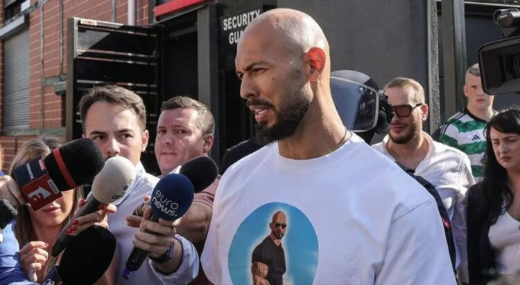 File/ Andrew Tate speaks to journalists as he is brought in for questioning by the Romanian gendarmes in Bucharest on August 21, 2024 (Image; Reuters)