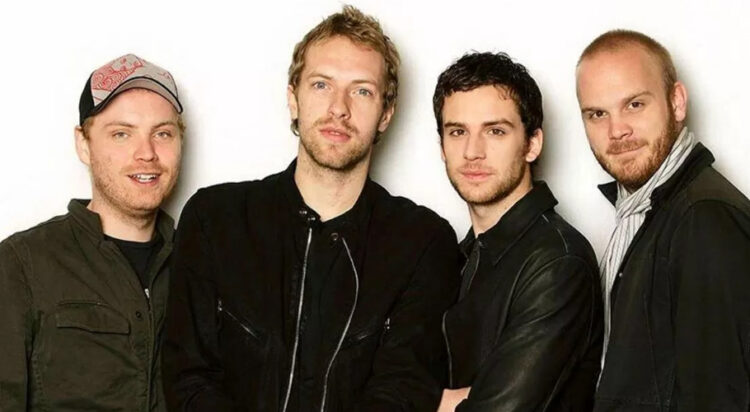 Coldplay has mesmerized audiences with their dynamic live shows and impressive discography, featuring Chris Martin (vocals, piano), Jonny Buckland (guitar), Guy Berryman (bass), Will Champion (drums, percussion), and Phil Harvey (manager). (Image: jagranjosh.com)