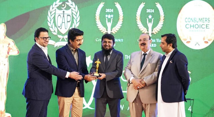 Muhammad Hussain receiving CEO of the year award
