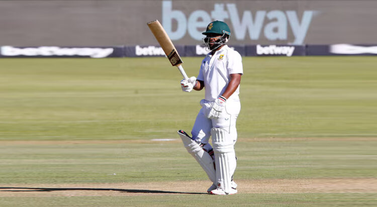 Cricket - First Test - South Africa v India - SuperSport Park Cricket Stadium, Pretoria, South Africa - December 28, 2021 South Africa's Temba Bavuma celebrates reaching his half century REUTERS/Rogan Ward/ File Photo