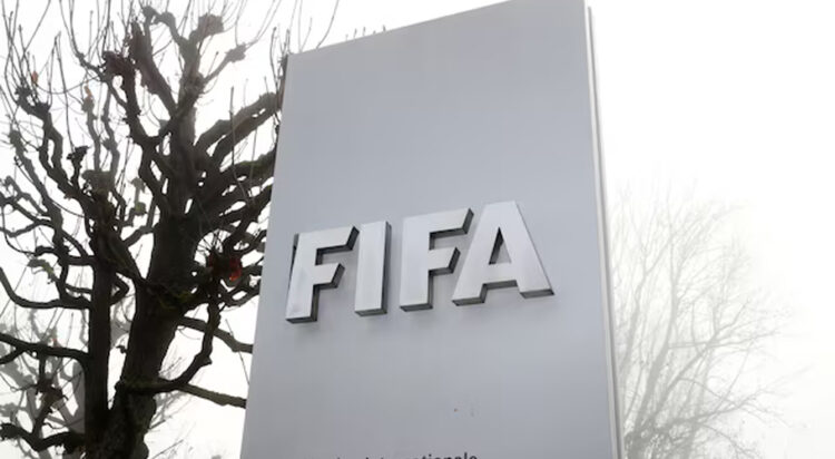 FIFA's logo is seen in front of its headquarters during a foggy autumn day in Zurich, Switzerland November 18, 2020. REUTERS/Arnd Wiegmann/File Photo