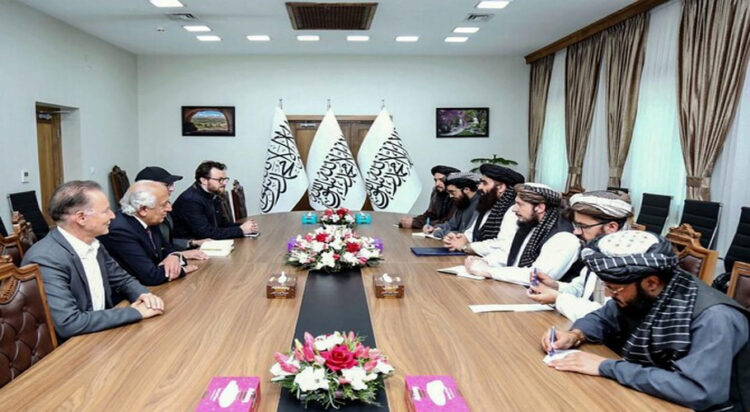 This handout photograph taken and released by Afghanistan’s Ministry of Foreign Affairs on March 20, 2025 shows US official Adam Boehler (3L) and former US envoy to Afghanistan Zalmay Khalilzad (2L) attending a meeting with Taliban foreign minister Amir Khan Muttaqi (4R), in Kabul. (AFP)
