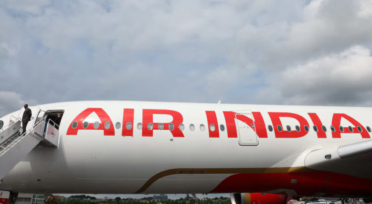 Branding for Air India is seen on an Airbus A350-900 at the Farnborough International Airshow, in Farnborough, Britain, July 24, 2024. REUTERS/Toby Melville/ File Photo