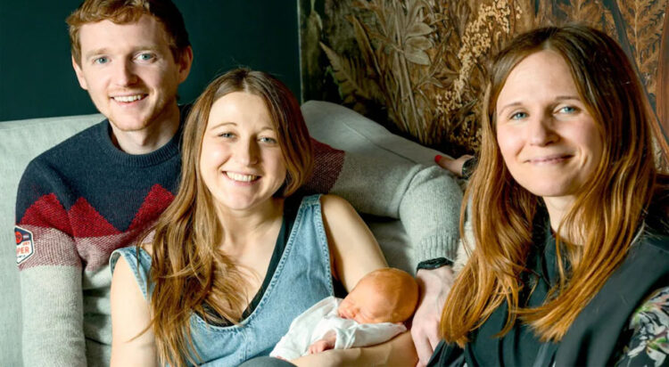 Grace and Angus Davidson with baby Amy Isabel, and her aunt Amy who donated her womb to her sister Credit: Womb Transplant UK/PA