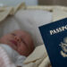 In this photo taken on Jan. 24, 2019, Denis Wolok, the father of 1-month-old Eva, shows the child's U.S. passport during an interview with The Associated Press in Hollywood, Fla.