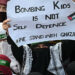 Supporters of the Jamaat-i-Islaami (JI) party hold a poster as they gather in solidarity with Palestinians during a protest in Islamabad on April 20. — AFP