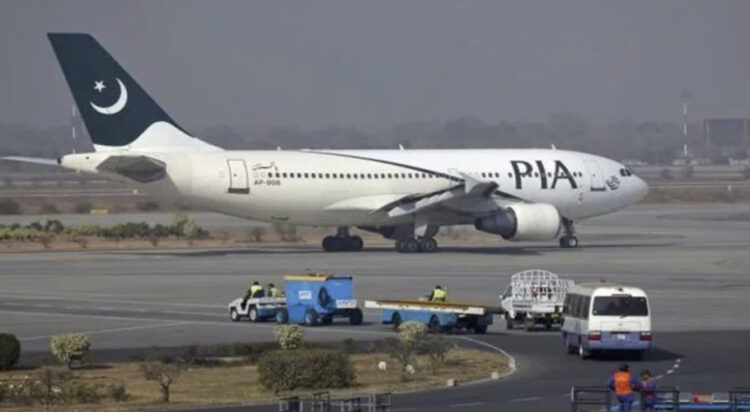 This undated images shows a PIA plane at the Lahore airport. (File Photo)