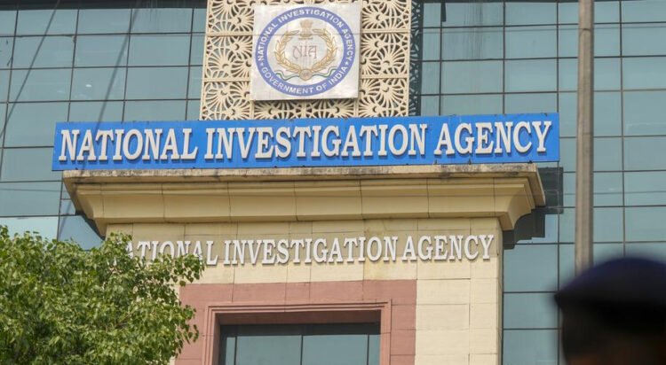 A security personnel stands guard near the National Investigation Agency (NIA) headquarters, in New Delhi. (File/PTI)