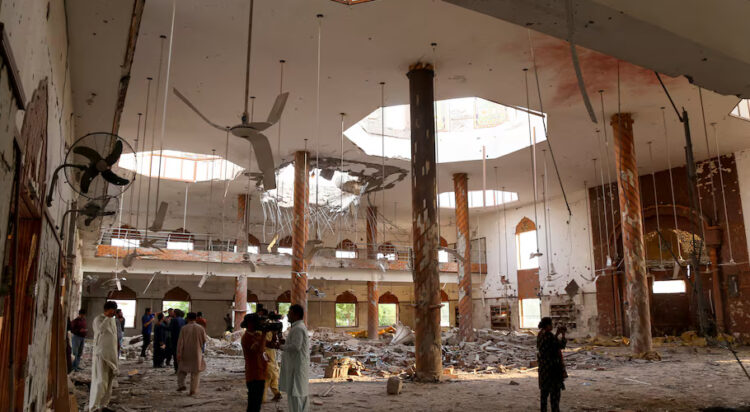 Members of the media film the inside of Subhan Mosque after it was hit by an Indian strike in Bahawalpur, Pakistan, May 7, 2025. REUTERS/Stringer