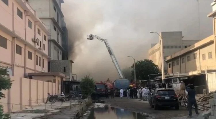 At least five firefighters injured as portion of building collapses.