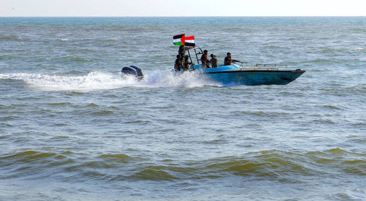 Members of the Yemeni Coast Guard affiliated with the Houthi group patrol the sea as demonstrators march through the Red Sea port city of Hodeida in solidarity with the people of Gaza on January 4, 2024. (File/AFP)