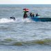 Members of the Yemeni Coast Guard affiliated with the Houthi group patrol the sea as demonstrators march through the Red Sea port city of Hodeida in solidarity with the people of Gaza on January 4, 2024. (File/AFP)