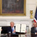 U.S. President Donald Trump, Azerbaijan's President Ilham Aliyev, and Armenia's Prime Minister Nikol Pashinyan pose with their documents during a trilateral signing event at the White House, in Washington, D.C., August 8, 2025. REUTERS/Kevin Lamarque Purchase Licensing Rights