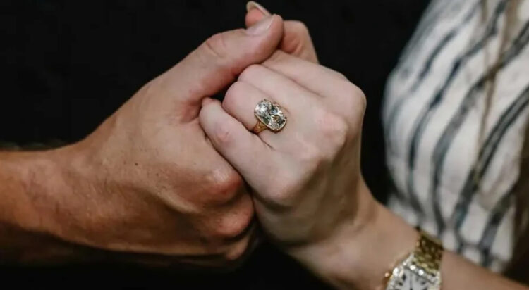 The couple announced their engagement against a floral background (Image: Instagram/Taylor Swift)