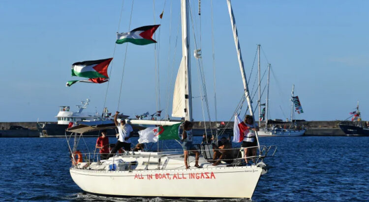Activists taking part in the Global Sumud Flotilla, bound for Gaza to break Israel's blockade on the Palestinian territory, ride aboard a sailboat in Tunisia's northern port of Bizerte on September 13, 2025 [AFP]