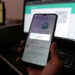 A Pakistani waits to connect his mobile WhatsApp with a desktop as internet runs slow past several days, in Karachi, Pakistan, on Aug. 19, 2024. (AP)