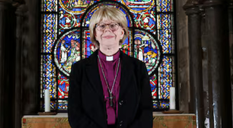 Archbishop of Canterbury-designate Sarah Mullally poses inside Canterbury Cathedral. REUTERS/Toby Melville