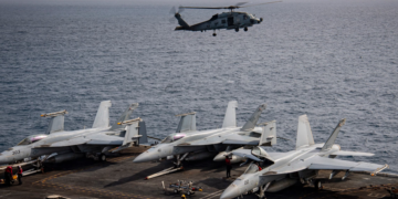 An MH-60R Sea Hawk helicopter attached to Helicopter Maritime Strike Squadron 73 prepares to land on the flight deck of the USS Nimitz in the U.S. Central Command area of responsibility Aug. 3, 2025. (U.S. Navy)