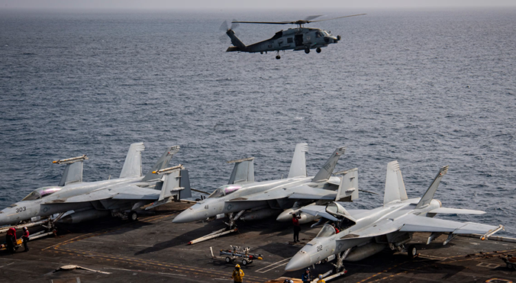 An MH-60R Sea Hawk helicopter attached to Helicopter Maritime Strike Squadron 73 prepares to land on the flight deck of the USS Nimitz in the U.S. Central Command area of responsibility Aug. 3, 2025. (U.S. Navy)
