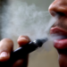 A man smokes a disposable vape, Newcastle-under-Lyme, Britain, September 14, 2023. REUTERS/Carl Recine
