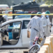 Members of the forensic team work after a blast outside a court building in Islamabad, Pakistan [Waseem Khan/Reuters]