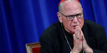 Cardinal Timothy Dolan attends a press conference following the election of Pope Leo XIV, at the Pontifical North American College in Rome, Italy, May 9, 2025. REUTERS/Guglielmo Mangiapane