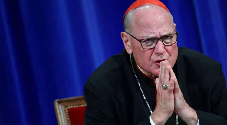 Cardinal Timothy Dolan attends a press conference following the election of Pope Leo XIV, at the Pontifical North American College in Rome, Italy, May 9, 2025. REUTERS/Guglielmo Mangiapane