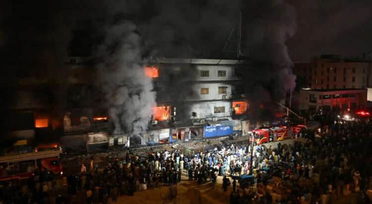 Firefighters douse a fire that broke out at the Gul Plaza shopping mall in Karachi on Jan 18, 2026. — AFP