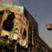Firefighters work next to smouldering remains following a massive fire at the Gul Plaza Shopping Centre in Karachi, on Jan 19, 2026. — Reuters