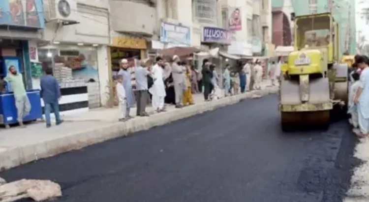This undated image shows road repair work in District East, Karachi. (Image: Express News)