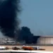 A fire broke out in Kuwait's largest oil refinery, Mina al-Ahmadi, following a drone strike on Thursday. (EPA/RAED QUTENA)