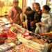 This undated image shows women busy in Eid shopping a local market. (APP)