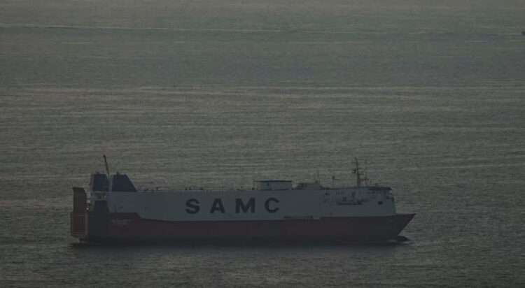 Cargo ships sail in the Arabian Gulf towards Strait of Hormuz in United Arab Emirates on Thursday. AP
