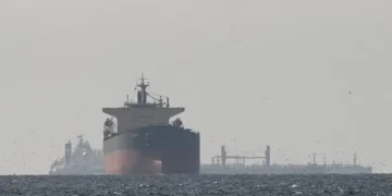 Tankers sail in the Gulf, near the Strait of Hormuz, as seen from northern Ras al-Khaimah, near the border with Oman’s Musandam governance, amid the U.S.-Israeli conflict with Iran, in United Arab Emirates, March 11, 2026. REUTERS/Stringer/File Photo