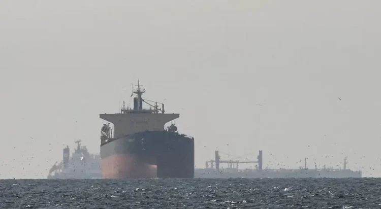 Tankers sail in the Gulf, near the Strait of Hormuz, as seen from northern Ras al-Khaimah, near the border with Oman’s Musandam governance, amid the U.S.-Israeli conflict with Iran, in United Arab Emirates, March 11, 2026. REUTERS/Stringer/File Photo