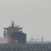Tankers sail in the Gulf, near the Strait of Hormuz, as seen from northern Ras al-Khaimah, near the border with Oman’s Musandam governance, amid the U.S.-Israeli conflict with Iran, in United Arab Emirates, March 11, 2026. REUTERS/Stringer/File Photo