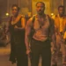 This image released by Warner Bros Pictures shows Michael B. Jordan, center, in a scene from “Sinners.” (Warner Bros. Pictures via AP)