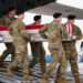 The bodies of the first six American soldiers killed in the U.S.-Israeli war on Iran arrived at Dover Air Force Base in Delaware on Saturday.
(Doug Mills/The New York Times)