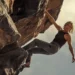 Theron plays Sasha, a grieving rock climber who travels to the Australian wilderness for isolation, only to be hunted by a ruthless serial killer played by Taron Egerton. Credit : Kane Skennar/Netflix