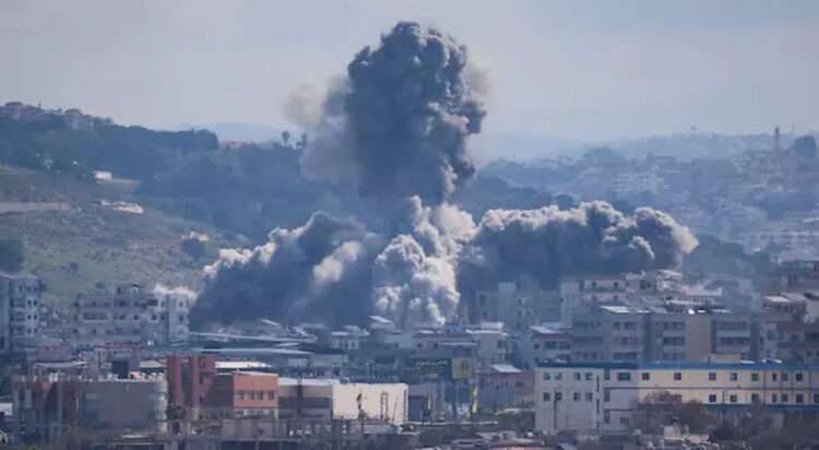 Smoke rises from an explosion in the Abbasiyeh neighbourhood following an Israeli strike, in Tyre, Lebanon, April 8, 2026. REUTERS