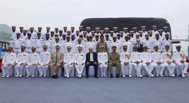 Pakistani and Chinese officials pose for a group photo during the commissioning ceremony of PNS Hangor in Sanya, China, on April 30, 2026. (X/@PresOfPakistan)