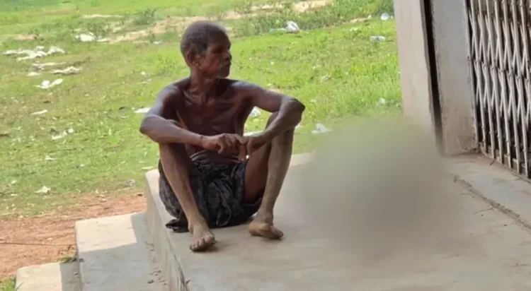The video of a man carrying the skeletal remains (blurred) of his sister went viral in India this week (BBC Hindi)