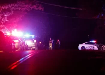 Police block off near S. Air Depot boulevard in Edmond, Okla., after a campground shooting at Lake Arcadia, Saturday, May 3, 2026. ASSOCIATED PRESS
