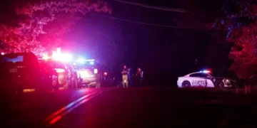 Police block off near S. Air Depot boulevard in Edmond, Okla., after a campground shooting at Lake Arcadia, Saturday, May 3, 2026. ASSOCIATED PRESS