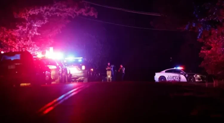 Police block off near S. Air Depot boulevard in Edmond, Okla., after a campground shooting at Lake Arcadia, Saturday, May 3, 2026. ASSOCIATED PRESS