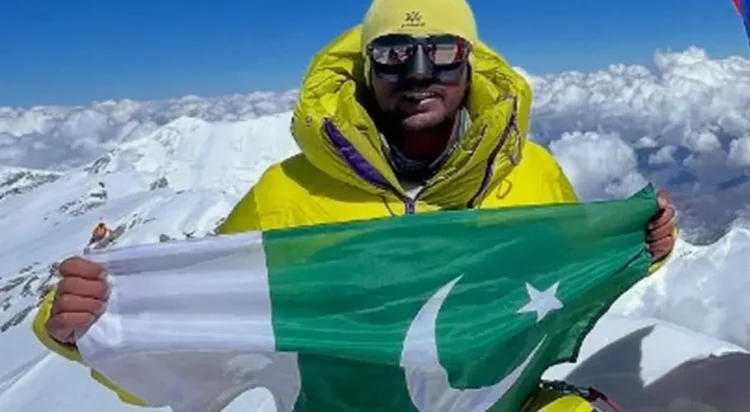 File/ Sajid Ali Sadpara raises Pakistan’s national flag at Nepal's 8167-metre-high Dhaulagiri mountain on May 10, 2025. — Instagram/ @sajidalisadpara